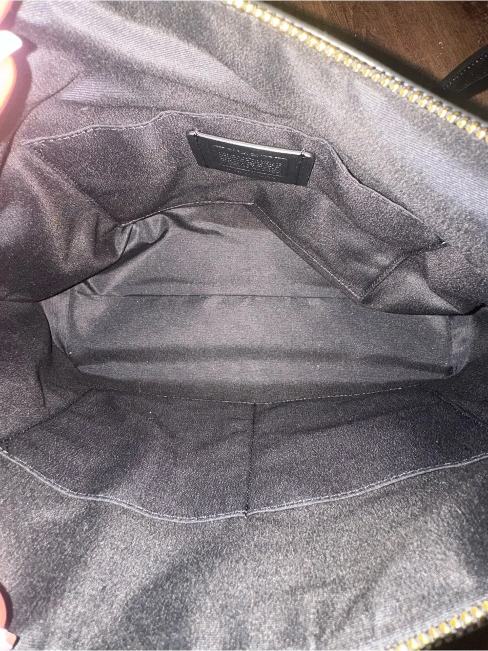 Coach worn couple